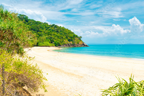 Tropical beach with white sand and green mountain in Koh Lanta island  Thailand