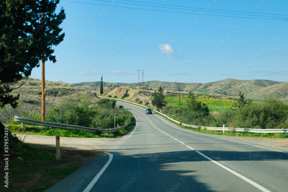 Scenic asphalt road in the rural countryside of Troodos mountains, Cyprus island