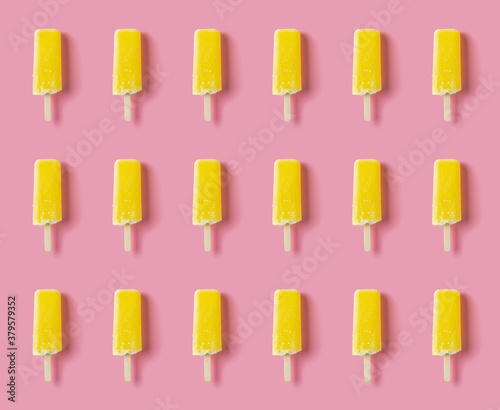 seamless yellow popsicle on a pink background