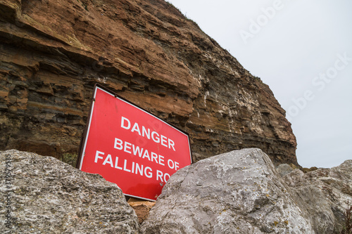 Danger beware of falling rocks photo