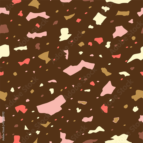 Background Terrazzo seamless pattern with motley stone or rock fractions. Elegant backdrop with mineral crumbs scattered on a light background.