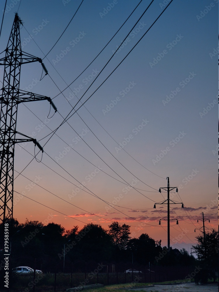 Fototapeta premium power lines at sunset