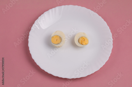 traditional healthy italian food. Tasty and fresh brown chicken eggs, raw and cooked, with their yellow yolk and egg white. Protein breakfast. Natural healthy food and organic farming concept.