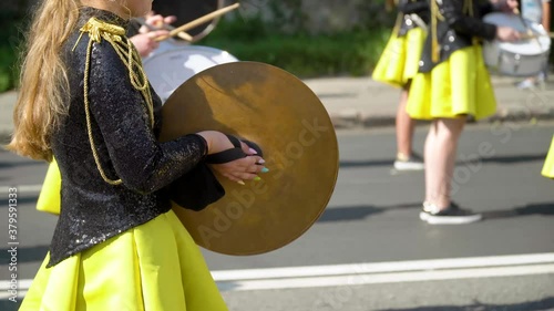 Young girls drummer at the parade. Street performance. Majorettes in the parade. Street performance after quarantine.