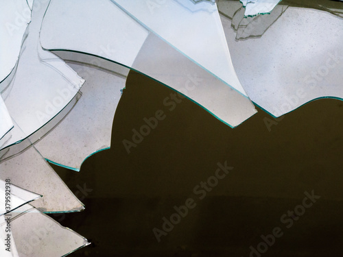 Fotografija Glass shards in a broken window