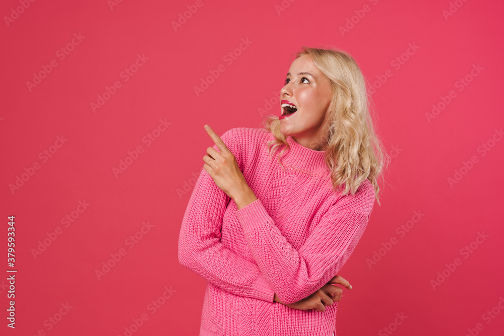 Excited young woman presenting copy space Excited young woman presenting copy space