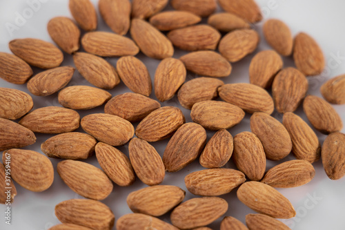 healthy almonds on white background