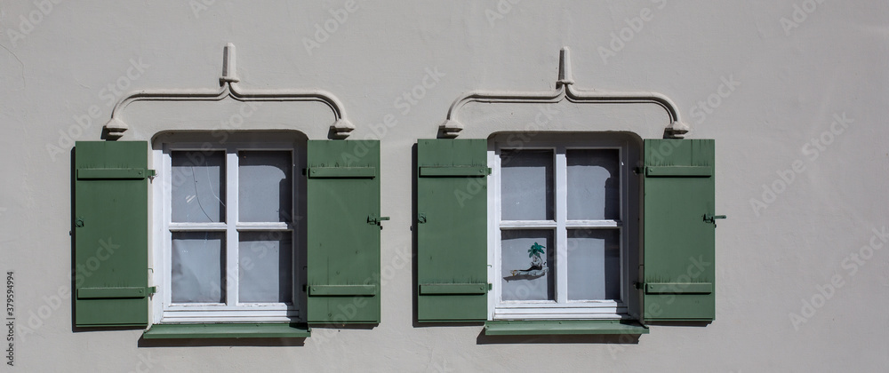 two windows in a stone house