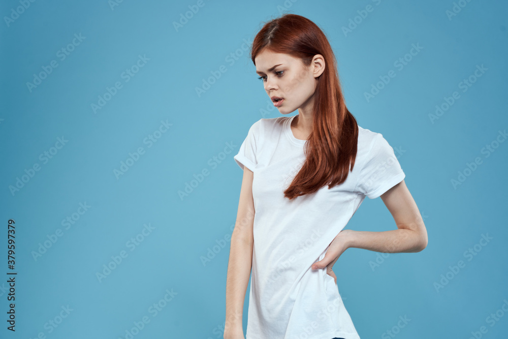 pretty woman white tshirt long hair glamor lifestyle cropped view blue background pretty woman white tshirt long hair glamor lifestyle cropped view blue background