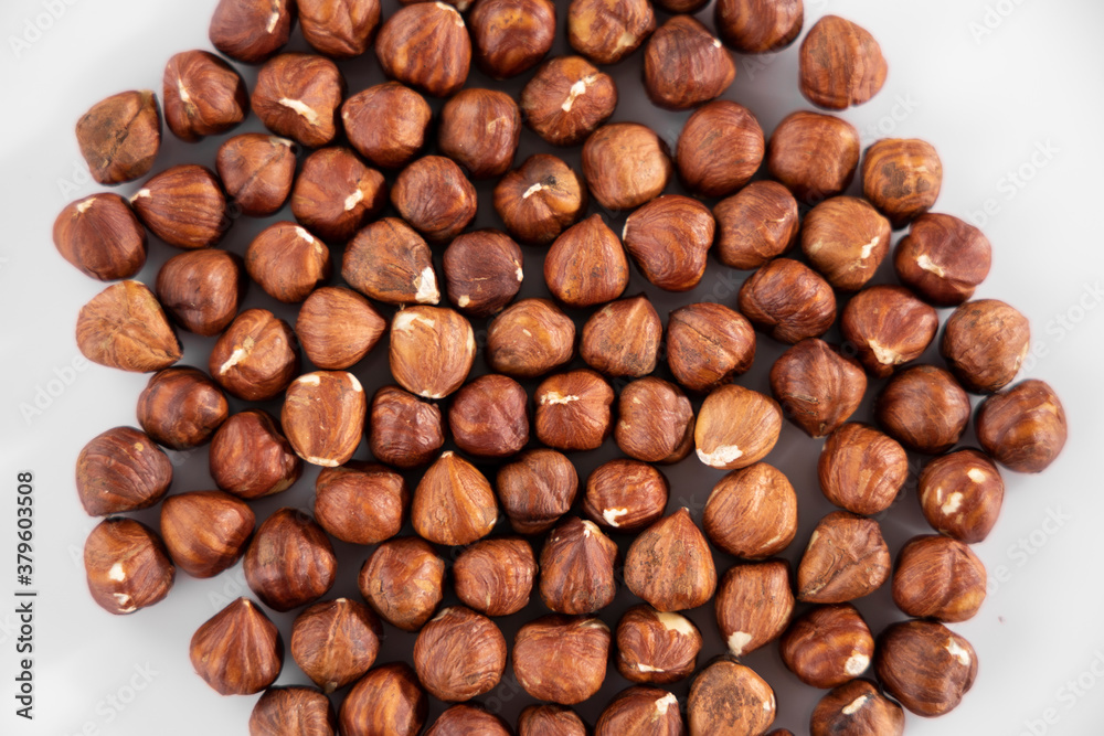 healthy hazelnuts on white background