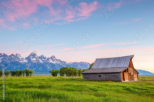 The abandoned barn in the Mormon Row, Wyoming with Grand Tetons view.