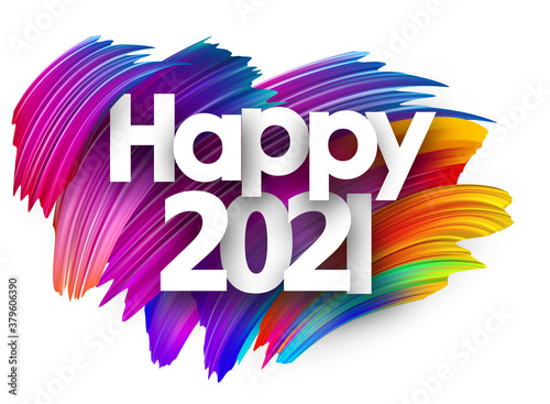 Happy 2021 sign on colorful brush strokes background.