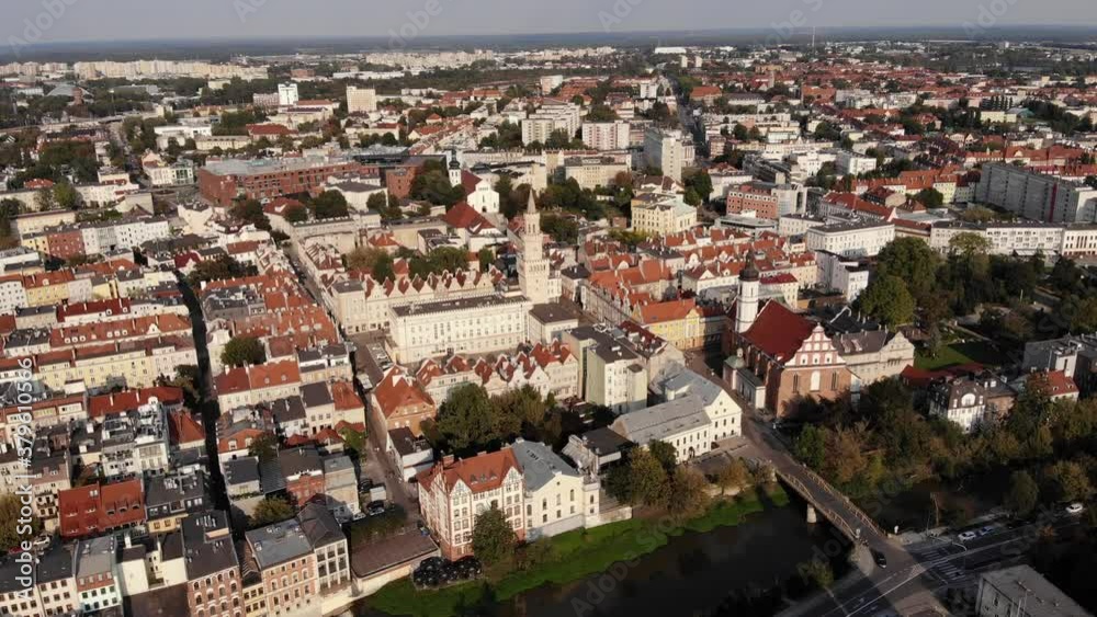 Opole , aerial view of Old Town and the river Oder. Poland, spring day. Drone shot on sunset time.4K, UHD, Cinematic Opole , aerial view of Old Town and the river Oder. Poland, spring day. Drone shot on sunset time.4K, UHD, Cinematic