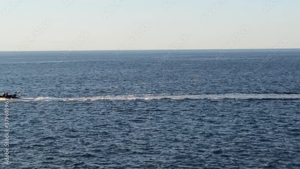 Boat crossing the sea at high speed Boat crossing the sea at high speed