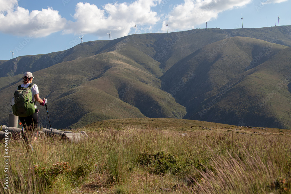 Obraz premium Mountain hiker alone, in the middle of the Serra da Freita, Arouca Geopark, Portugal