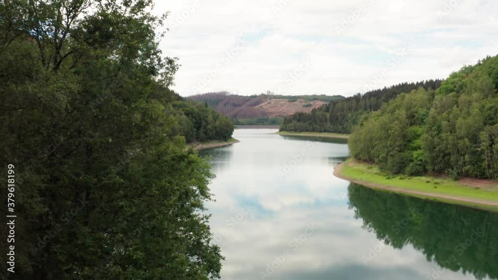 a dam in nature filmed towards the dam in 4k a dam in nature filmed towards the dam in 4k