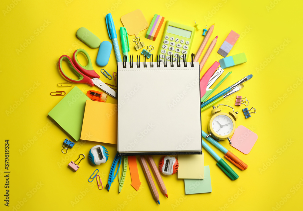 Blank notebook and school stationery on yellow background, flat lay ...