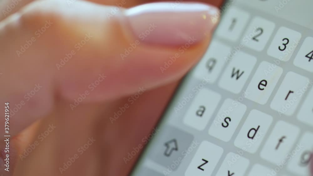 Hands typing text on smartphone close-up Hands typing text on smartphone close-up