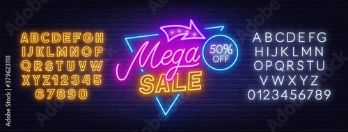 Mega Sale neon sign on brick wall background. Yellow and white neon alphabets. Template for discount.
