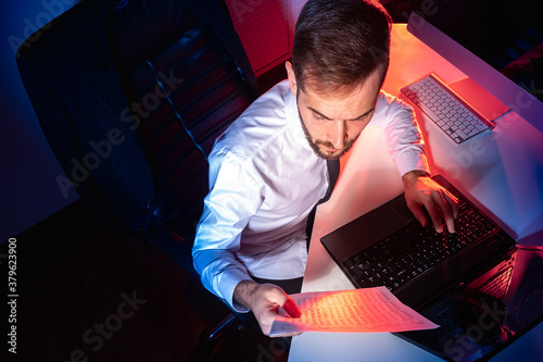 Office worker next to a lap...