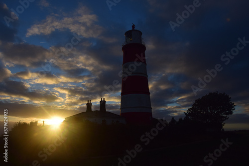 lighthouse at sunrise