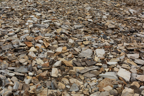 Shale stone texture. Lots of broken stones. River stones.