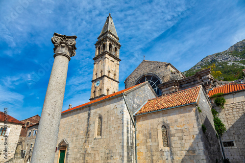 View of the Catholic Saint Nicholas church on the main square downtown of Perast, Montenegro photo