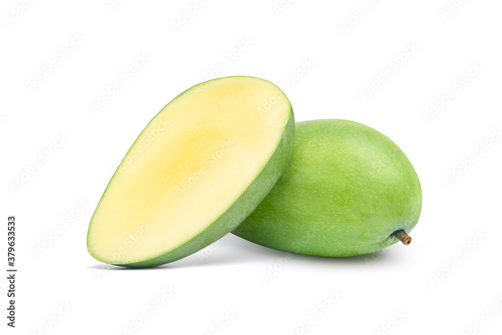 Green mango with cut in half isolated on white background. Clipping path. Green mango with cut in half isolated on white background. Clipping path.