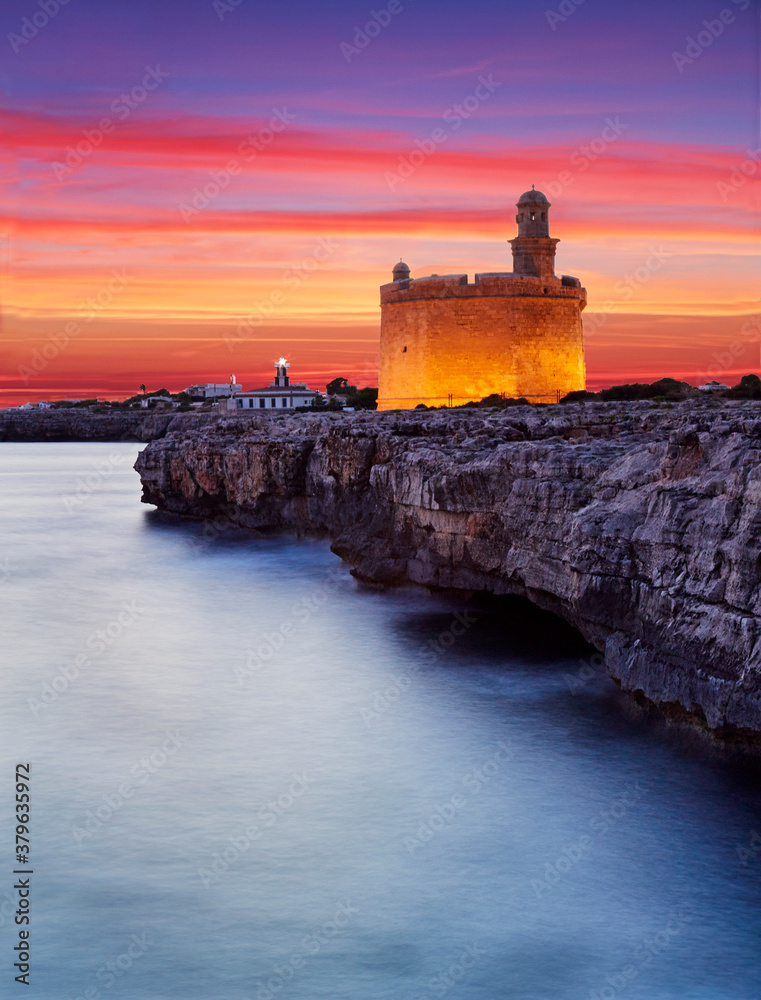 'The Watchtower' illuminated at sunset in Ciutadella in Menorca