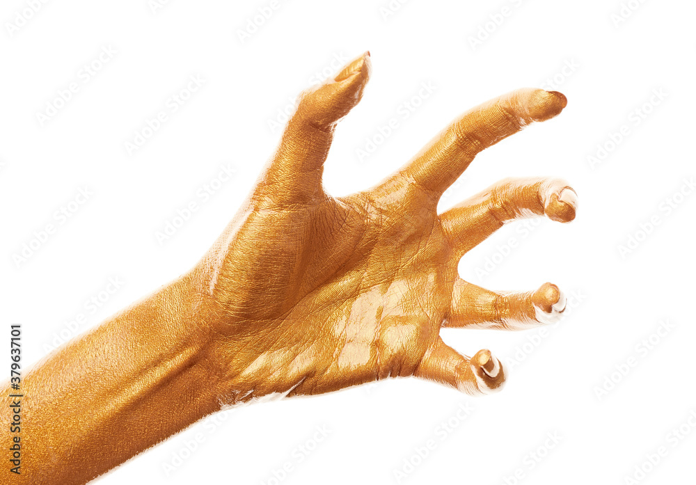 Hands in gold paint. Golden fingers. Female hand isolated on white background. White woman's hand showing symbols and gestures.