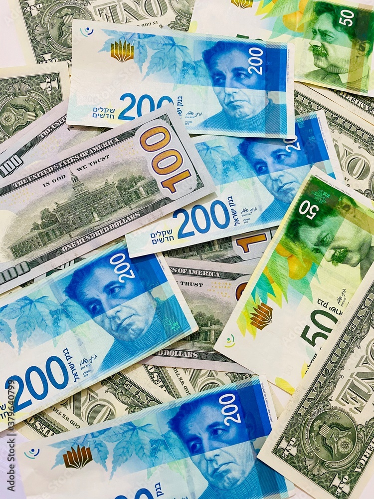 Obraz premium Shekels and dollars, politics money and the financial crisis of a wealthy Israeli origin. saving money. business in Israel.