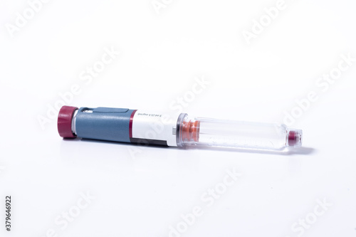 syringe over white background