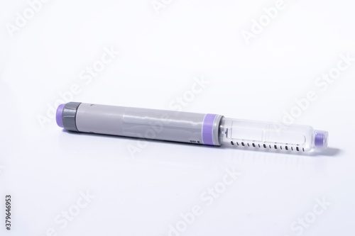 syringe over white background