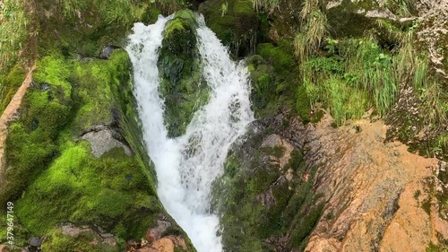 Landscape of Dachserfall Waterfall next to village Abtenau Austria. photo