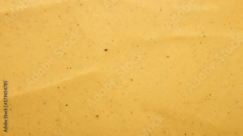 Russian mustard.The texture of the mustard.Yellow mustard background top view.