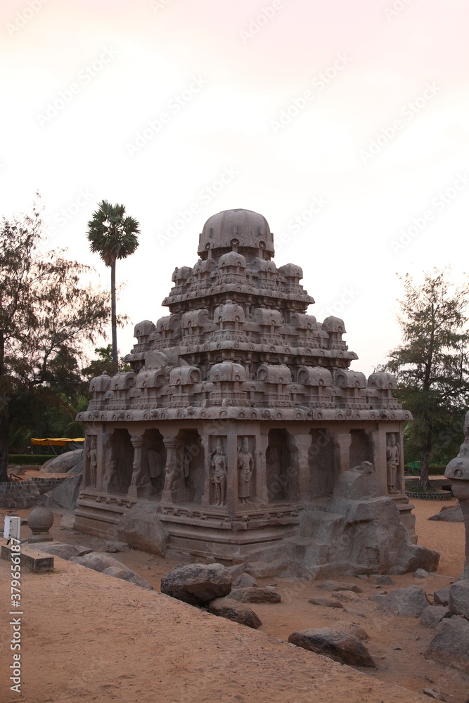 View of Ancient Monolithic temples Five Rathas (Indian: Pancha Rathas) of Mahapalipuram under sunset in Tamil Nadu, India View of Ancient Monolithic temples Five Rathas (Indian: Pancha Rathas) of Mahapalipuram under sunset in Tamil Nadu, India