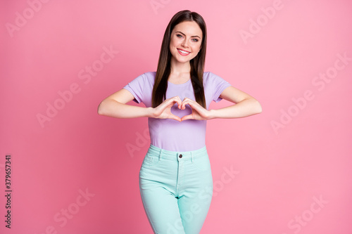 Photo of attractive amazing lovely lady show make arms heart shape figure romantic mood inviting boyfriend date prom wear casual violet t-shirt pants isolated pink pastel color background