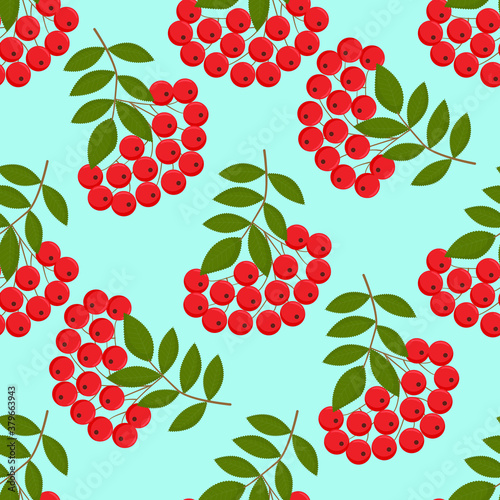 Seamless colorful autumn pattern with rowan berries and green leaves. Floral rowan illustration for print.
