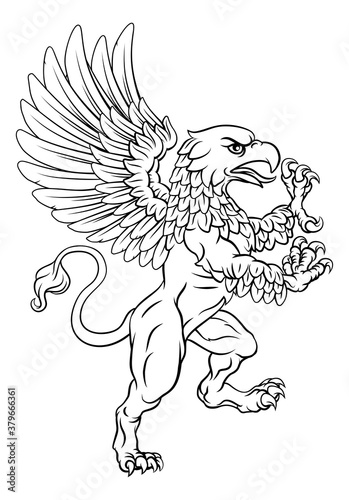 A griffin also known as a gryphon or griffon with lion body, wings and eagle head. Rampant standing on hind legs coat of arms crest mascot