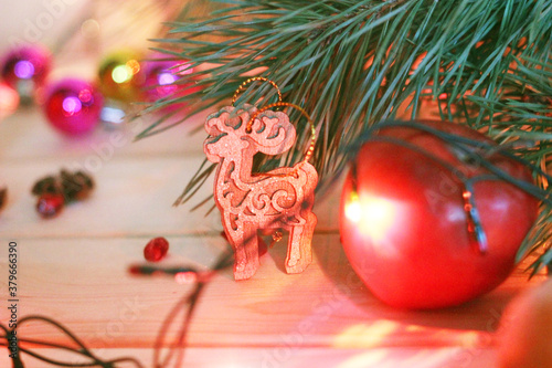 Pine branch, chocolate, orange and beautiful Christmas decorations © Evgenia