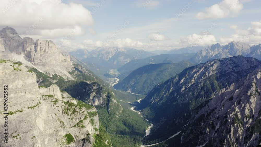 Aerial pan above italian alps, dolomites above the canyon Aerial pan above italian alps, dolomites above the canyon