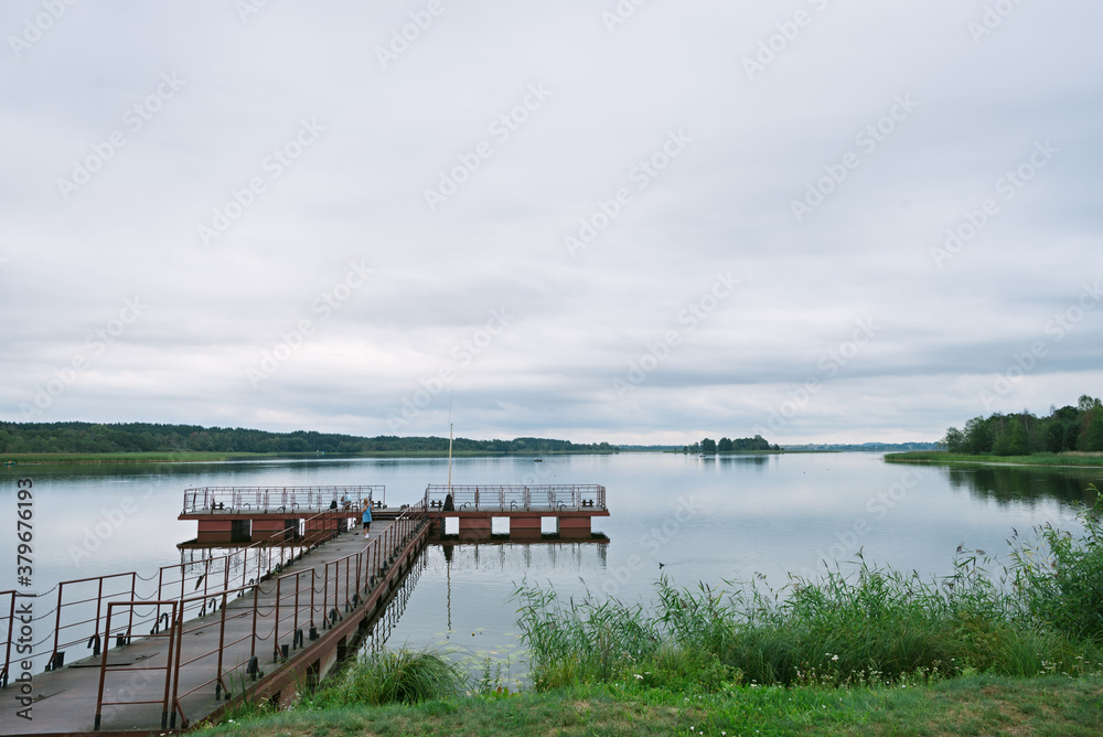 Iron pier on Lake Dryvyaty on a summer day. Braslav lakes. Belarus Iron pier on Lake Dryvyaty on a summer day. Braslav lakes. Belarus