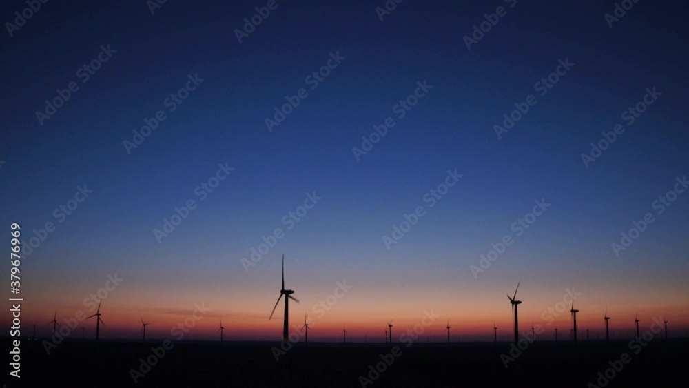 Aerial view of wind farm at sunset Aerial view of wind farm at sunset