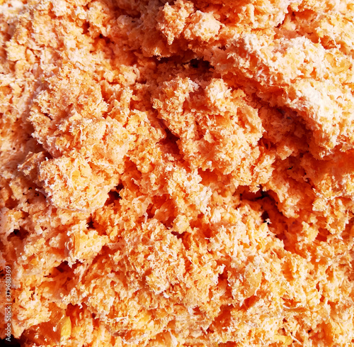 Canvas-taulu loose orange texture of vegetable mush of carrot