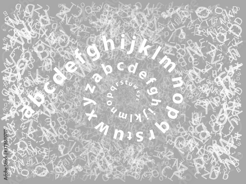 Spiral alphabet with fly lettres on grey background.