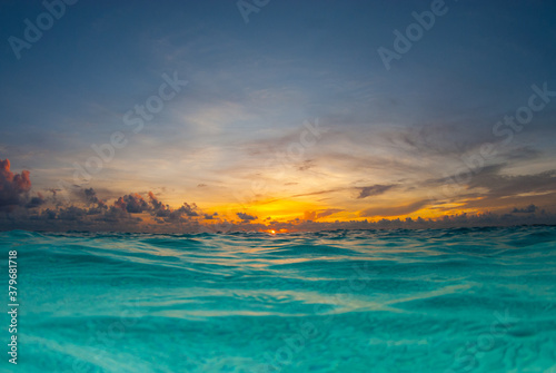 A sunrise shot over the water of the Caribbean Sea © drew