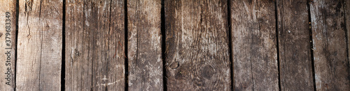 Wood planks texture as background or wallpaper. View from above. Place for text. Photo banner.