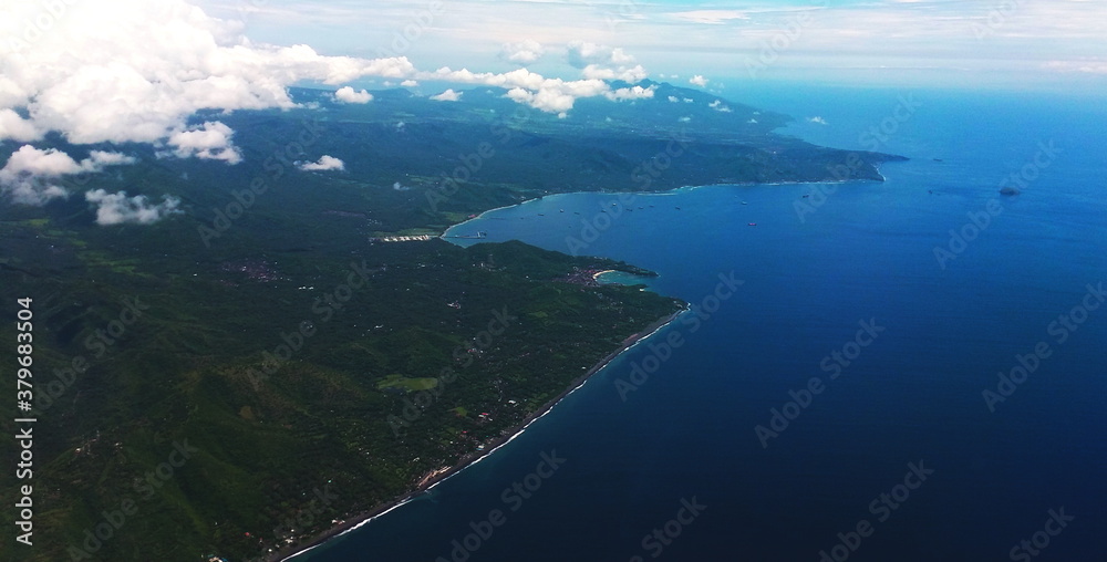 Top View of Bali Indonesia with Cloudy Sky and Blue Sea