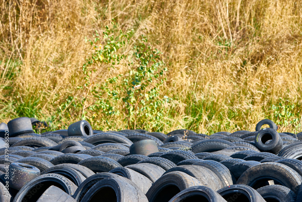 a pile of used rubber on the ground a pile of used rubber on the ground