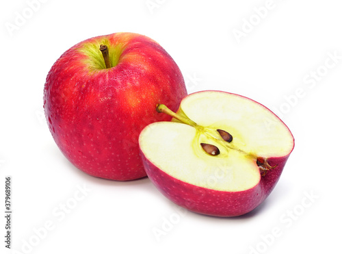 Ripe red apple fruit with apple half on white background.